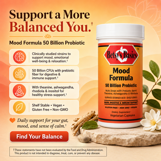 Betsy's Basics Mood Formula 50 Billion Probiotic supplement bottle shown on a warm beige background with promotional text, icons, and natural props including a stone slab, green leaves, and a white flower.