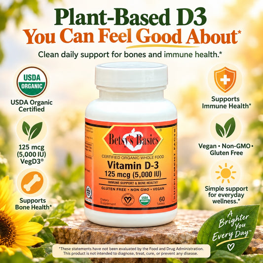 Betsys Basics Certified Organic Whole Food Vitamin D-3 5,000 iu supplement bottle on a light background with greenery and sunflowers and key selling points like supports immune health