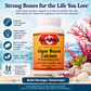 Betsy's Basics Algae Based Calcium dietary supplement bottle shown on a coral reef background with marketing text and icons on the left.