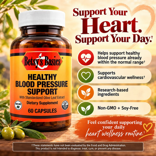 Betsy's Basics Healthy Blood Pressure Support dietary supplement bottle with a white cap and orange label, shown on a warm olive-green background with olives and promotional text about heart support and cardiovascular wellness.
