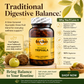 A promotional product graphic for Betty's Basics Triphala herbal supplement. The amber glass bottle is centered on a warm beige background with green leaves and whole fruits around it.